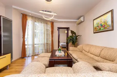 a living room with a couch and a table at Centrally-located 1BD Apartment near Kapana by Flat Mаnager in Plovdiv