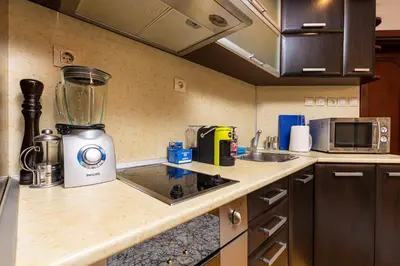 a kitchen with a blender on top of a counter at Centrally-located 1BD Apartment near Kapana by Flat Mаnager in Plovdiv
