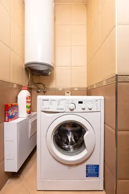 a washer and dryer in a small room at Centrally-located 1BD Apartment near Kapana by Flat Mаnager in Plovdiv