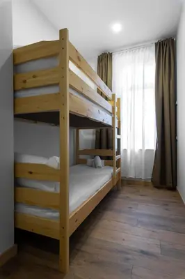 a bedroom with two bunk beds in a room at La Luna - High-end 2BD Flat in the TOP centre by Flat Mаnager in Sofia
