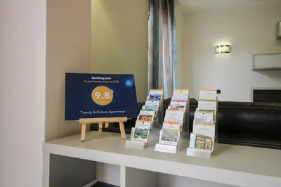 a table with a display of books on it at Trendy & Deluxe Apartment by Flat Mаnager in Plovdiv