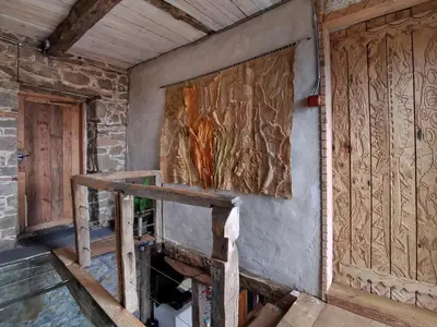 a room with a wall covered in wood at Вила 'Гнездото', Villa 'The nest', Rhodope mountains, Banite in Vishnevo