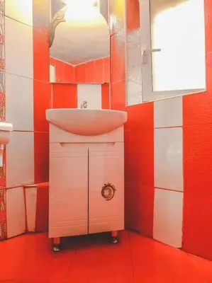 a bathroom with a sink and a mirror at Top Center Apartment 2 in Sofia