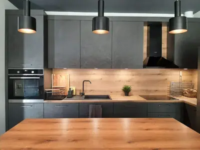 a large kitchen with a wooden table in it at Вила Bora Vista 1 in Tsigov Chark