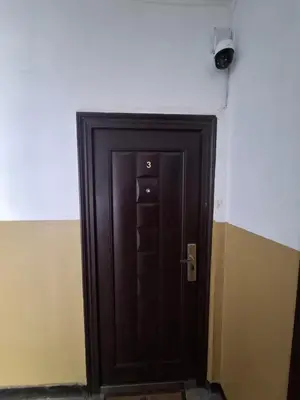 a black door in the corner of a room at 3 Rooms Apartment, Top Center, 1st Floor Flat, AUBG, WiFi, PC i5 SSD, Tablet, AndroidMiTvBox, 3 LED TVs 200 Channels, Long Terrace, Self-Easy-Late Check-in, Stay Before Greece in Blagoevgrad