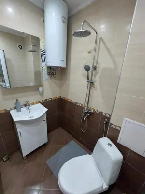 a bathroom with a toilet and a shower and a sink at 3 Rooms Apartment, Top Center, 1st Floor Flat, AUBG, WiFi, PC i5 SSD, Tablet, AndroidMiTvBox, 3 LED TVs 200 Channels, Long Terrace, Self-Easy-Late Check-in, Stay Before Greece in Blagoevgrad