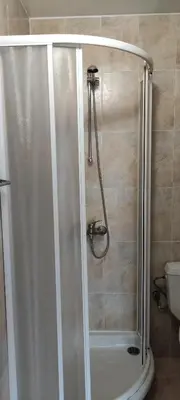a shower with a glass door in a bathroom at Apartment SUNNY&RELAX Pamporovo The Castle 2 in Pamporovo