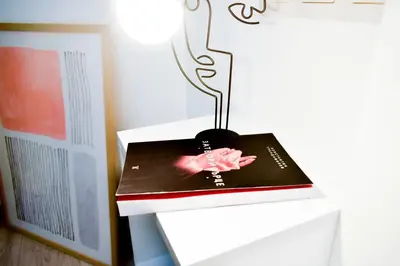 a book sitting on top of a table at Duplex Condo Prime Location 2BTH 2 Studios in Sofia