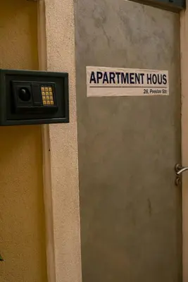 a sign on the side of a door with a participant hours at Cozy studio with FRENCH WINDOWS in Plovdiv