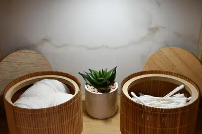 two wooden baskets with noodles and a plant on a table at Comfort 37 - Luxury ski apartment near the gondola in Bansko