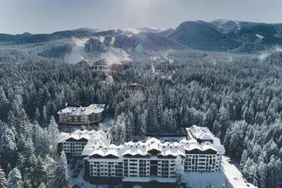 an aerial view of a resort in the mountains at NEAT STUDIOS in 
