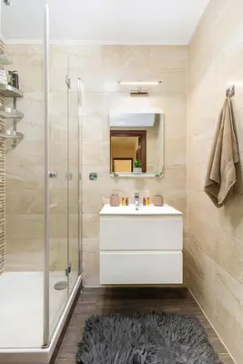 a bathroom with a sink and a shower at 2BR apartment ,10 minutes walk to TOP Center in Plovdiv