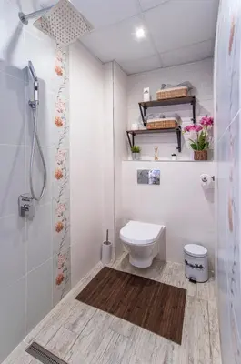 a white bathroom with a toilet and a shower at The Music House - Exclusive Studio in the Heart of Sofia by Flat Mаnager in Sofia