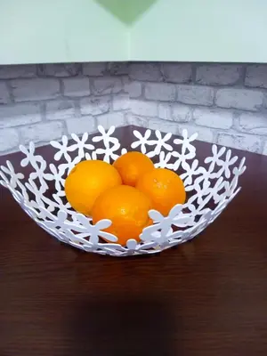 a bowl of oranges sitting on top of a table at Апартамент в центъра на София - plus Free Vouchers in Sofia
