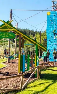 a park with a playground with a roller coaster at Apartment in Bansko in Bansko