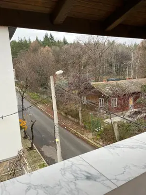 a view from a window of a street with a street light at Дом за Гости Осогово in Kyustendil