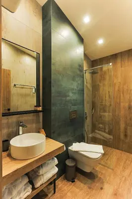 a bathroom with a sink and a toilet and a shower at Terme di Hissar Village in Hisarya