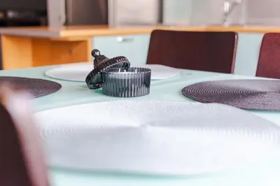 a table with napkins and a napkin holder on it at Your home away from home in Sofia