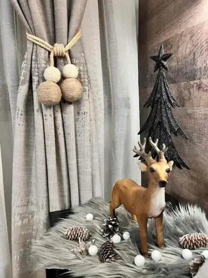 a figurine of a deer and a christmas tree at Апартамент - Боровец Хотел ''Боровец Гардънс'' A 44 in Borovets