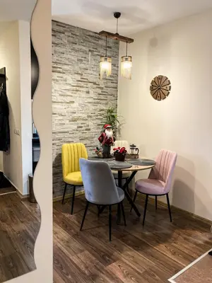 a dining room with a table and chairs at Studio Stankovic Royal Towers 326 in Bansko