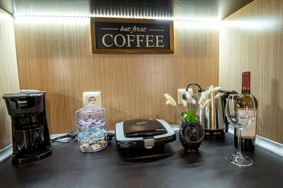 a coffeemaker and a coffee maker on a counter at Studio Stankovic Royal Towers 326 in Bansko