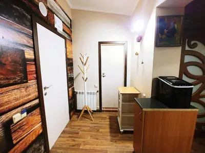 a room with a hallway with a door and a mirror at Boutique & artistic 3 bedroom apartment. in Pamporovo