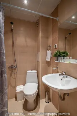 a bathroom with a toilet and a sink at MOMA - Charming home in the heart of Bansko Ancient Center in Bansko