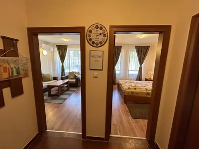 a room with a room with a bed and a mirror at Charming apartmnet near Gondola and Bar street in Bansko