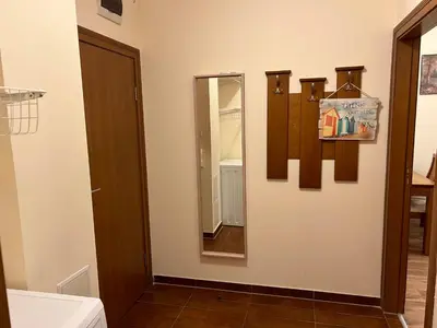 a bathroom with a mirror on the wall at Charming apartmnet near Gondola and Bar street in Bansko