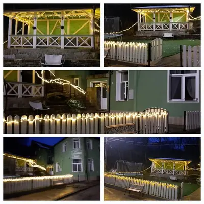 a group of four pictures with lights on a fence at Зеления Осъм Green Osam in Chiflik