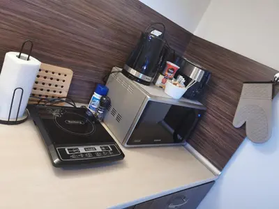 a coffeemaker sitting on top of a kitchen counter at Pirin and Bansko view Studio in Bansko