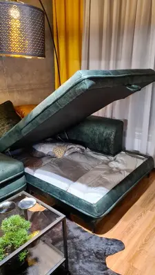 a bed in a room with a green bed frame at Apartmanica Double room apartment 101-12, with AC, big terrace, St Ivan Rilski 4 star SPA Resort, Bansko in Bansko