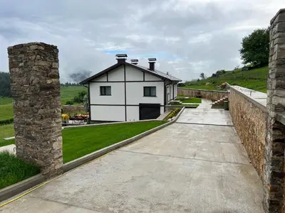 a house in the middle of a stone wall at Вила ИГЛИКА in Yagodina