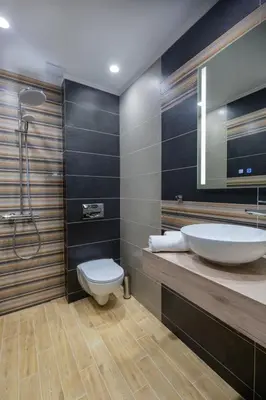 a bathroom with a sink and a toilet at Вила ИГЛИКА in Yagodina