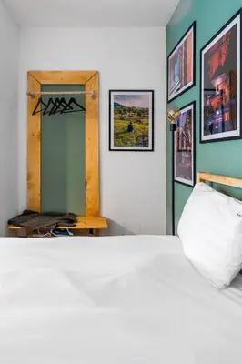 a bedroom with a white bed and a mirror at Modern&Stylish Studio in City Centre by Flat Mаnager in Sofia