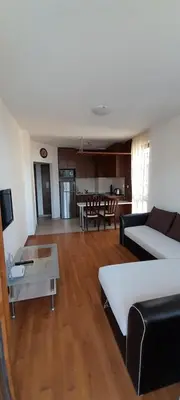 a living room with a couch and a table at Belvedere Holiday Club К302 in Bansko