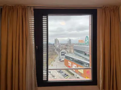 a large window with a view of a city at SliverCity next to paradise mall in Sofia