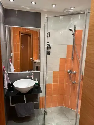 a bathroom with a shower and a sink and a shower at SliverCity next to paradise mall in Sofia