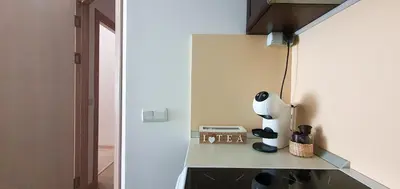 a kitchen with a counter with a lamp on it at Gondola Ski Lift Apartment in Bansko
