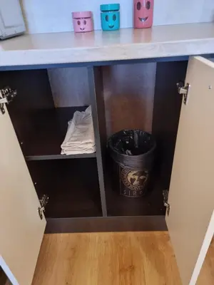 a desk with a trash can under it at Suite Roma 2 at Spa Club Bor in Velingrad