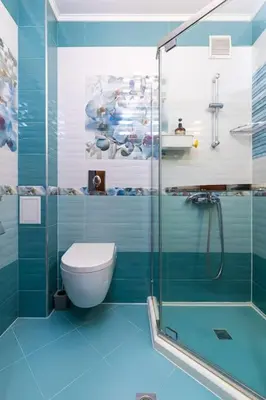 a bathroom with a toilet and a glass shower at Dufti Home in Plovdiv Center & Old Town / Kapana in Plovdiv