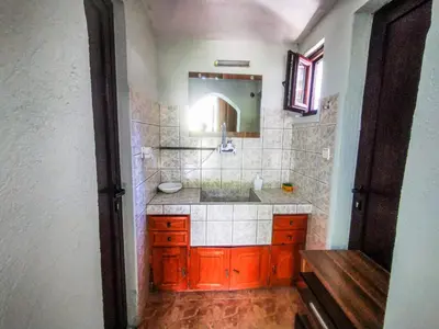 a bathroom with a sink and a mirror at Apartments Dream in Sarnitsa