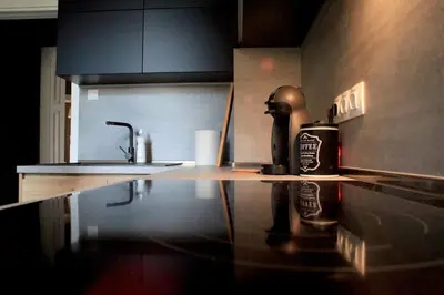 a kitchen counter top with a coffee maker on it at *CITADEL* 2BR - city center in Sofia