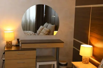 a bathroom with a sink and a mirror at Apartment Svetoslava in Pamporovo