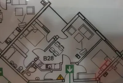 a drawing of a floor plan of a house at Large 2-bedroom apt near ski road, 5 min to Gondola & Bar Street in Bansko