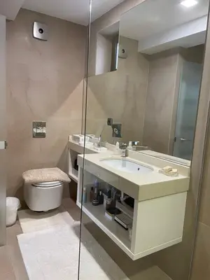 a bathroom with a sink and a toilet and a mirror at Luxury guests house “Heaven Hill”, Pravets city in Pravets