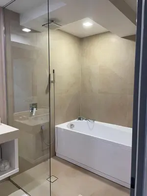 a bathroom with a bath tub and a sink at Luxury guests house “Heaven Hill”, Pravets city in Pravets