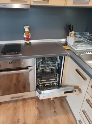 a kitchen with an oven with a dish rack at Apartment 2 Detelina Residence in Bansko