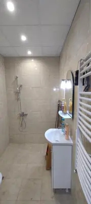 a bathroom with a shower and a sink and a toilet at Luxury and stylish apartmen, metro station Obelya in Sofia