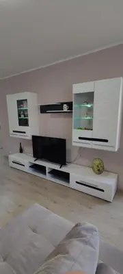 a living room with a tv and a couch at Luxury and stylish apartmen, metro station Obelya in Sofia